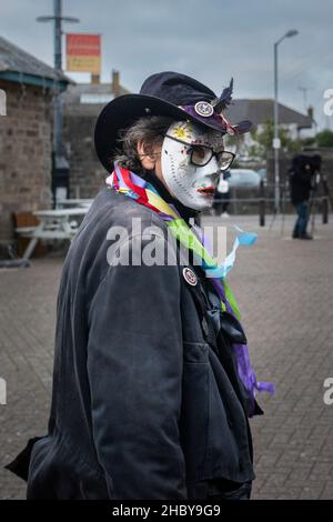 A masked participant in the Montol Festival in Penzance in Cornwall. The festival is a revival or reinterpretation of many of the traditional Cornish Stock Photo