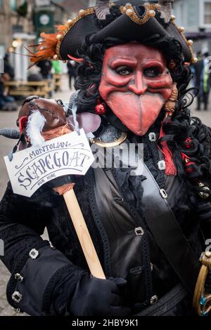 A masked participant in the Montol Festival in Penzance in Cornwall. The festival is a revival or reinterpretation of many of the traditional Cornish Stock Photo