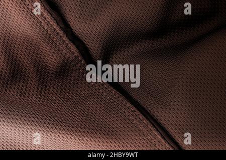 Dark moody woolen fabric texture background with abstract pattern Stock Photo