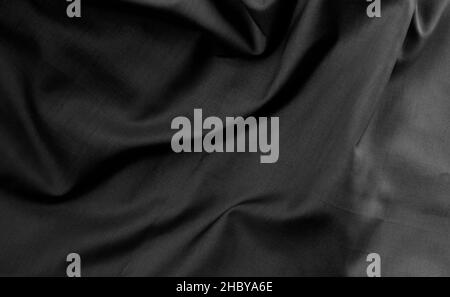 Dark moody twisted fabric with shallow depth of field for texture background Stock Photo