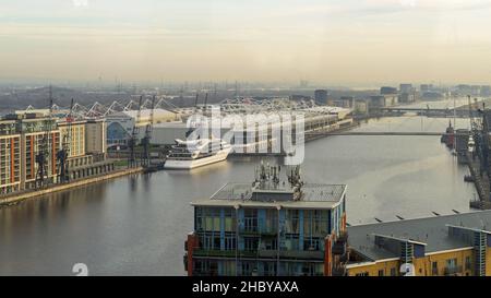 Royal Victoria Dock with the Excel Exhibition Centre from above on a sunny morning. London - 22nd December 2021 Stock Photo