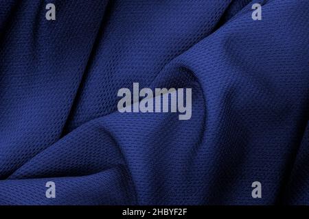 Close up view of royal blue color folded linen fabric cloth for texture background Stock Photo