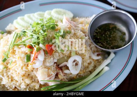 Thai seafood fried rice served with thai fish sauce. Stock Photo