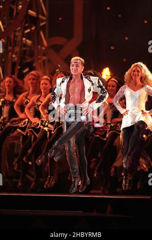 Michael Flatley on stage performing his last ever show 'Feet Of Flames' a unique one off performance of 'Lord Of The Dance' held in Hyde Park, London. 25th July 1998. Stock Photo