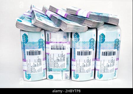 Russia. 17th Dec, 2011. In this photo bundles of banknotes with a nominal value of 1000 Russian rubles in a bank package. The photo shows 4,500,000 rubles, this is the approximate cost of an apartment in a provincial city. (Credit Image: © Alexander Sayganov/SOPA Images via ZUMA Press Wire) Stock Photo