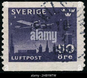 POLTAVA, UKRAINE -Desember 22 , 2021. Vintage stamp printed in Sweden circa 1930 shows Airmail Stock Photo