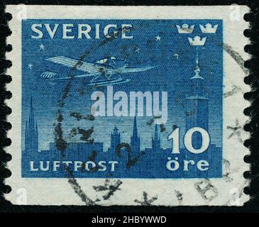 POLTAVA, UKRAINE -Desember 22 , 2021. Vintage stamp printed in Sweden circa 1930 shows Airmail Stock Photo
