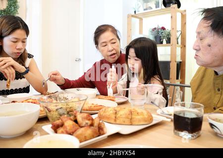 Chinese family have variety food togethrer. Stock Photo