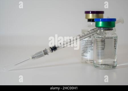bottles with medication and injection solution, syringe, equipment for ...