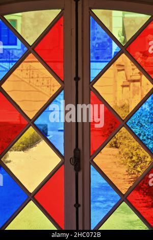 Stained glass window-garden path-trimmed hedges-staircase railing-south facing façade. NeoRococo palace-Estoi-Algarve-Portugal-022 Stock Photo