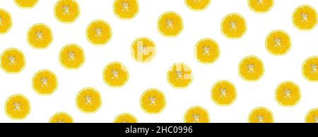Lemon slices, top view of lemon slices isolated on a white background. Citrus pattern concept photo. Stock Photo