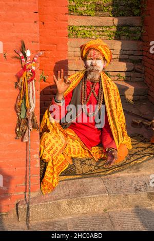 A sadhu, Hindu ascetic or holy man in the Pashupatinath temple complex in Kathmandu, Nepal. Stock Photo