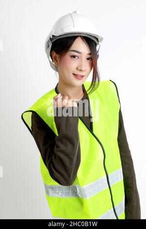 The Asian womna standing on the white background. Stock Photo
