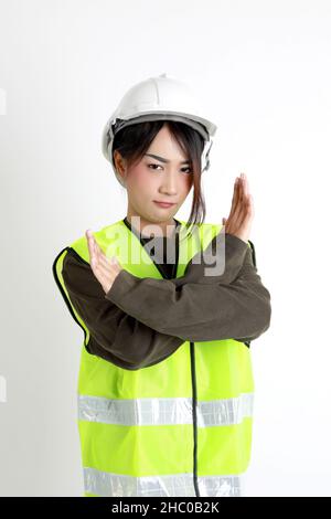 The Asian womna standing on the white background. Stock Photo