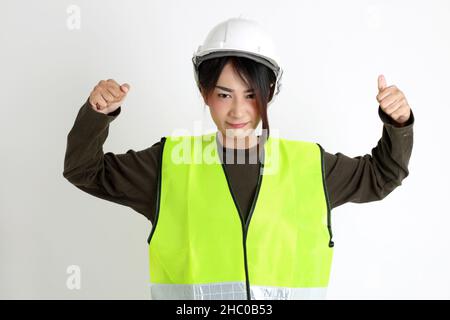 The Asian womna standing on the white background. Stock Photo