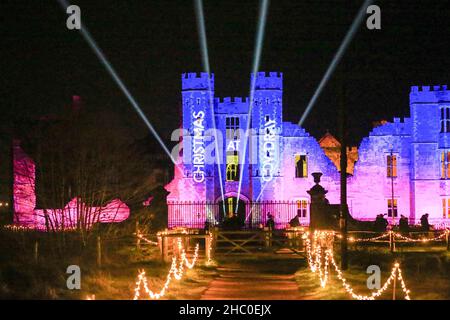 Cowdray Park, Midhurst. 22nd December 2021. An illuminated, after dark, festive light trail held in the grounds of the historic Cowdray estate, in the heart of the stunning South Downs National Park. Inspired by the theme ‘Joy' the work created by a select band of international artists casts the landscape in a new light, illuminating the nights sky, with millions of sparkling lights, interactive installations and joyful sounds. Credit: james jagger/Alamy Live News Stock Photo