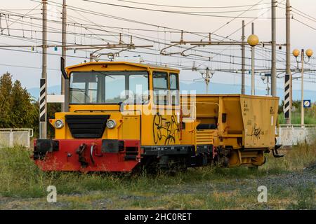 Locomotive wagons for railway line maintenance parked on a siding Stock Photo