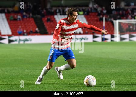 Granada, Granada, Spain. 22nd Dec, 2021. Santiago Arias of Granada CF in action during the Liga match between Granada CF and Atco Madrid at Nuevo Los Carmenes Stadium on December 22, 2021 in Granada, Spain. (Credit Image: © José M Baldomero/Pacific Press via ZUMA Press Wire) Stock Photo