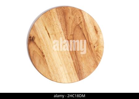 Round, wooden cutting board on a white background Stock Photo