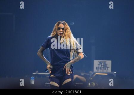 Kehlani performing on stage while she opens for Demi Lovato during the 2018 “Tell Me You Love Me” tour at Target Center in Minneapolis, Minnesota. Stock Photo