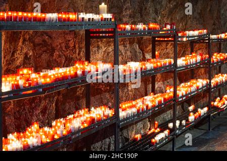 Covadonga sanctuary and cave with candles. Asturias landmark. Spain Stock Photo