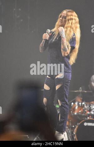 Kehlani performing on stage while she opens for Demi Lovato during the 2018 “Tell Me You Love Me” tour at Target Center in Minneapolis, Minnesota. Stock Photo