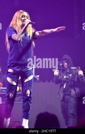 Kehlani performing on stage while she opens for Demi Lovato during the 2018 “Tell Me You Love Me” tour at Target Center in Minneapolis, Minnesota. Stock Photo