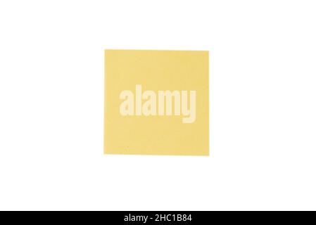 A sticker and a paper clip isolated on a white background. Copy space. Stock Photo
