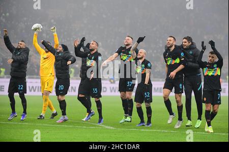 Milan, Italy. 22nd Dec, 2021. FC Inter's players celebrate at the end of a Serie A football match between FC Inter and Torino in Milan, Italy, on Dec. 22, 2021. Credit: Str/Xinhua/Alamy Live News Stock Photo