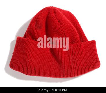 Red wooly hat or beanie. Wool knitted hat. Stock Photo