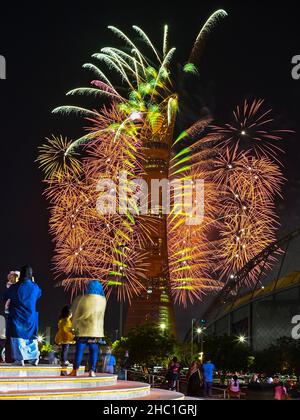 Doha, Qatar. 17th Dec, 2021. People watch fireworks on the eve of Qatar National Day in Doha, Qatar, on Dec. 17, 2021. Qatar will celebrate its National Day on Dec. 18. Credit: Nikku/Xinhua/Alamy Live News Stock Photo