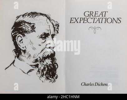 Great Expectations book - classic novel by Charles Dickens. Title page and drawing of the author. Stock Photo