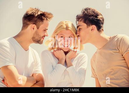 Friend zone concept. Happy together. Cheerful friends. People outdoors. Happy woman and two men. Member friendship wishes to enter into romantic Stock Photo