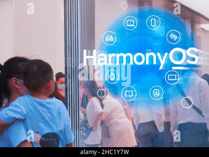 SHANGHAI, CHINA - JUNE 14, 2021 - Consumers experience the multi-platform (mobile phone, PC, TV and tablet) of The Huawei HarmonyOS  at huawei's flags Stock Photo
