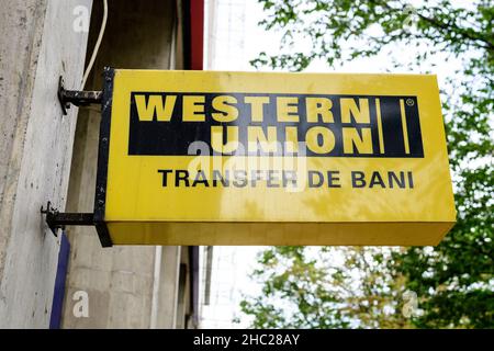 Bucharest, Romania - June 6, 2020: Entry sign with logo for Western Union financial services Stock Photo