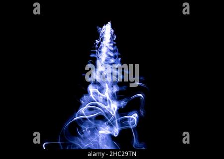 Blue smoke on a black background Stock Photo
