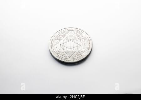 An Ethereum silver coin photographed on a white background, as a product shooting Stock Photo