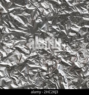 Seamless texture of crumpled aluminum foil sheet. Top view. Stock Photo