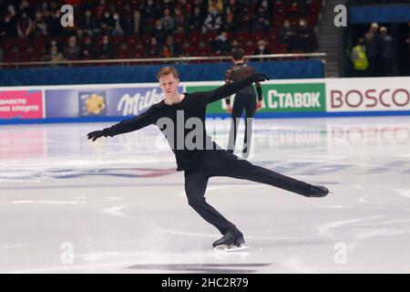 Saint Petersburg, Russia. 23rd Dec, 2021. Mikhail Kolyada of Russia competes during the Men's Short Program on day one of the Rostelecom Russian Nationals 2022 of Figure Skating at the Yubileyny Sports Palace in Saint Petersburg. Credit: SOPA Images Limited/Alamy Live News Stock Photo