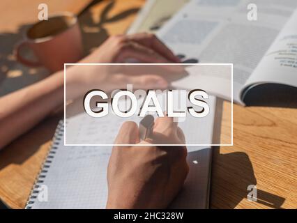 Goals setting concept. Aim and objective word on photo. Stock Photo