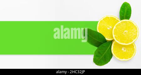 Creative composition layout background mock up with ripe lemons and leaf. Flat lay, copy space Stock Photo