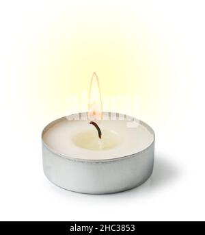 burning tea light candle isolated on white background Stock Photo