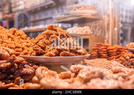 Traditional moroccan sweets on sale at a street food stall or market Stock Photo