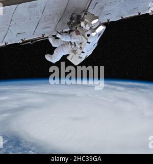 Space walking astronaut above the Earth Stock Photo