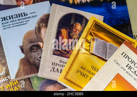 Russia - December 2020: Religious literature of Jehovah's Witnesses (organization banned in Russia). Books of the early 2000s in Russian Stock Photo