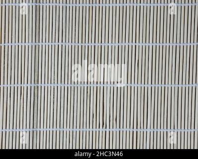 sushi mat texture for background, backdrop, wallpaper, banner, poster, scrapbook. Stock Photo
