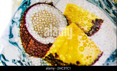 Closeup of the wet picture of the coconut and pineapple. Stock Photo