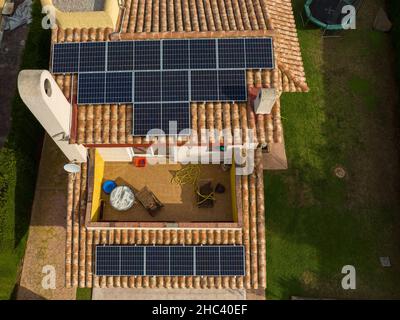 Overhead view of solar panels installed on the roof Stock Photo