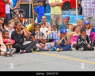 kids watching a street show. Stock Photo