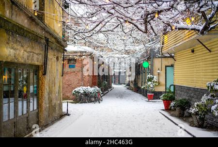 Winter day on a snowy street in the Karakoy district in Istanbul, Turkey. Stock Photo